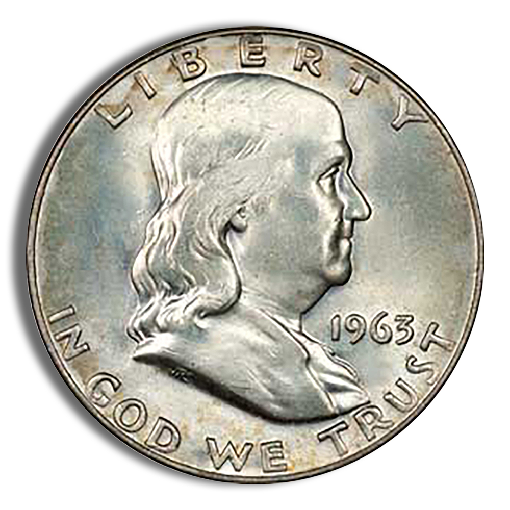 Close-up of a 1963 Franklin half dollar coin, featuring the profile of Benjamin Franklin, with the inscriptions "LIBERTY" and "IN GOD WE TRUST." The coin showcases its silver surface and detailed engraving.