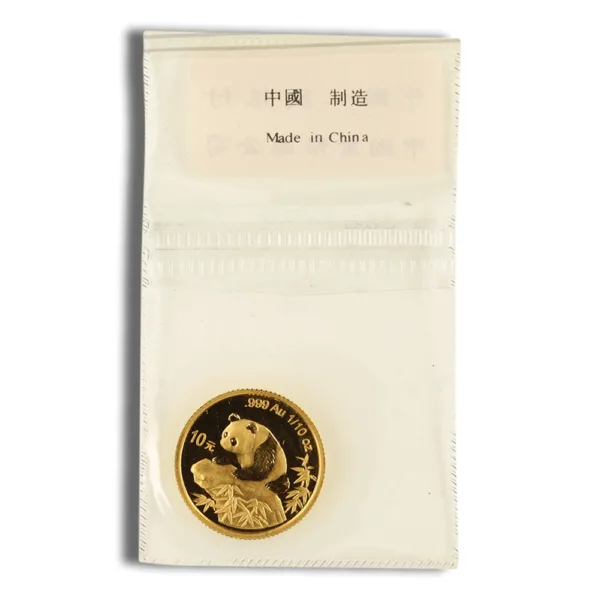 Gold Chinese Panda coin in protective packaging, featuring a panda design, marked with "999 Au" and "1/10 oz," indicating its purity and weight, with a label stating "Made in China."