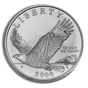 Silver coin featuring an eagle in flight, inscribed with "Liberty," "In God We Trust," and the year "2008." The design showcases intricate details of the eagle and a mountainous landscape in the background. Ideal for collectors and investors.
