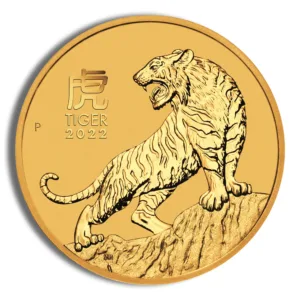 Gold coin featuring a tiger design, symbolizing the Year of the Tiger 2022, with intricate detailing on the tiger and the year inscribed.