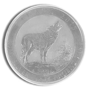 Silver coin featuring a howling wolf design, surrounded by a decorative border, symbolizing wildlife and nature conservation.
