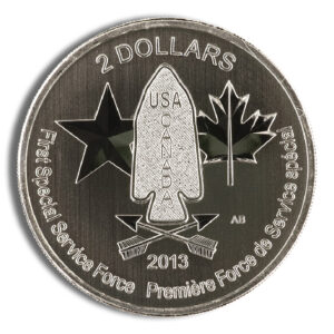 Two-dollar commemorative coin featuring the emblem of the First Special Service Force, with the year 2013, and symbols representing the USA and Canada, including stars and maple leaves.