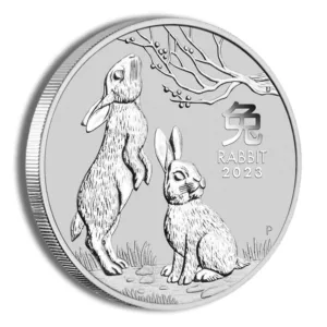 Silver coin featuring two rabbits, one standing and one sitting, with a tree in the background, symbolizing the Year of the Rabbit in the Chinese zodiac.