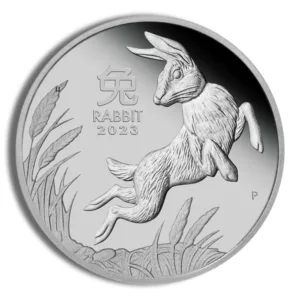 Silver coin featuring a leaping rabbit design, inscribed with "Rabbit 2023" and decorative elements, representing the Year of the Rabbit in the Chinese zodiac.