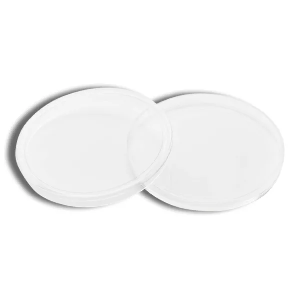 Two simple white oval plates stacked together, ideal for serving appetizers or desserts in a modern dining setting.