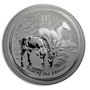 Silver coin featuring two horses, symbolizing the Year of the Horse in the Chinese zodiac, with intricate designs depicting a natural landscape.