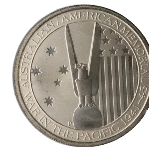 Alt text: Commemorative medal featuring an eagle and stars, inscribed with "Australian American Memorial," and dated 1941-45, symbolizing cooperation in the Pacific during World War II.