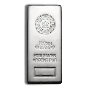100 oz silver bullion bar featuring a purity of 999.9, marked with the Royal Canadian Mint logo and inscriptions "FINE SILVER" and "ARGENT PUR." Ideal for investment and collectors.