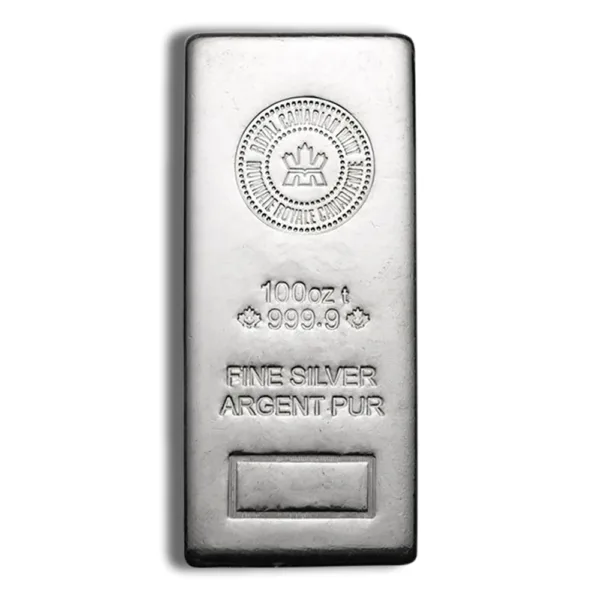 100 oz silver bullion bar featuring a purity of 999.9, marked with the Royal Canadian Mint logo and inscriptions "FINE SILVER" and "ARGENT PUR." Ideal for investment and collectors.
