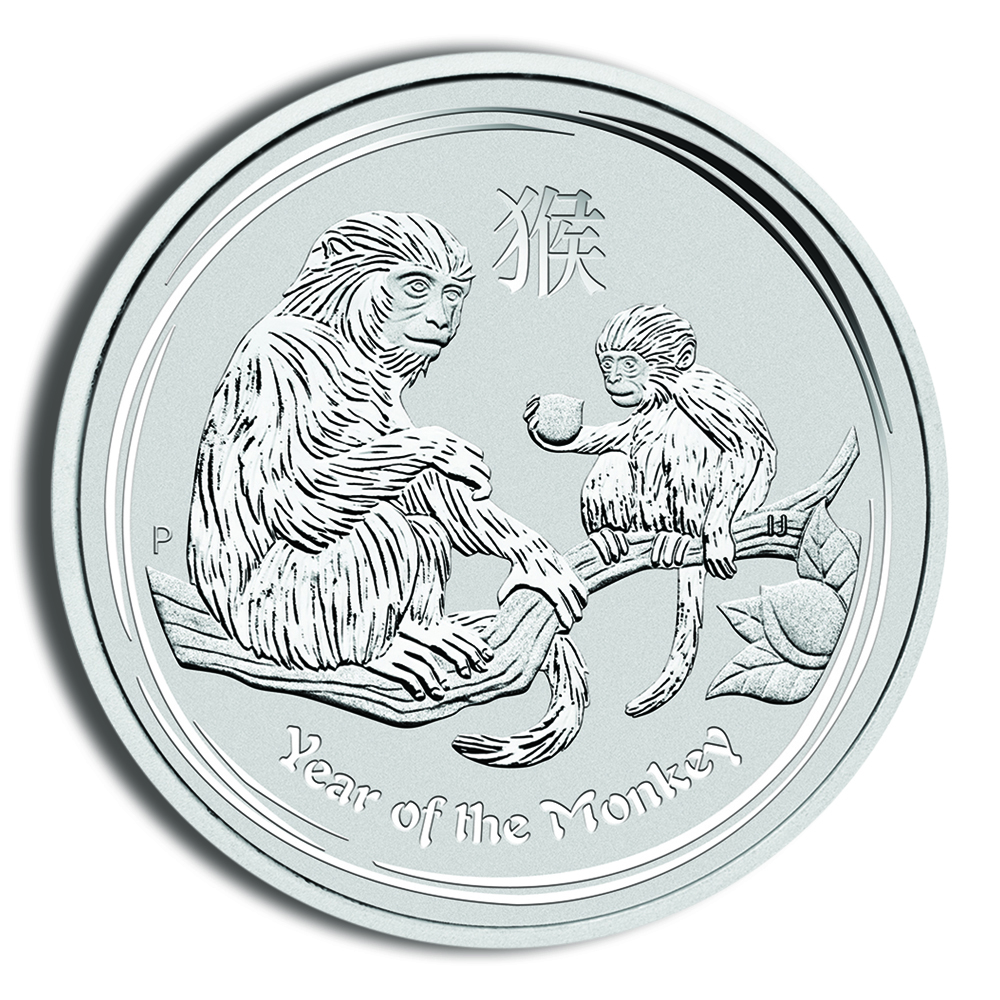 Silver coin featuring a detailed engraving of a monkey and its offspring on a branch, symbolizing the Year of the Monkey in the Chinese zodiac.