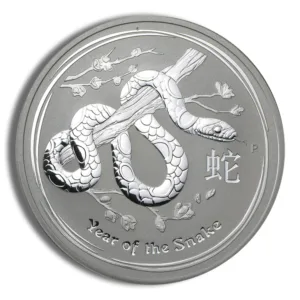 Silver coin featuring a snake design, symbolizing the Year of the Snake in Chinese zodiac, with intricate detailing and floral elements.