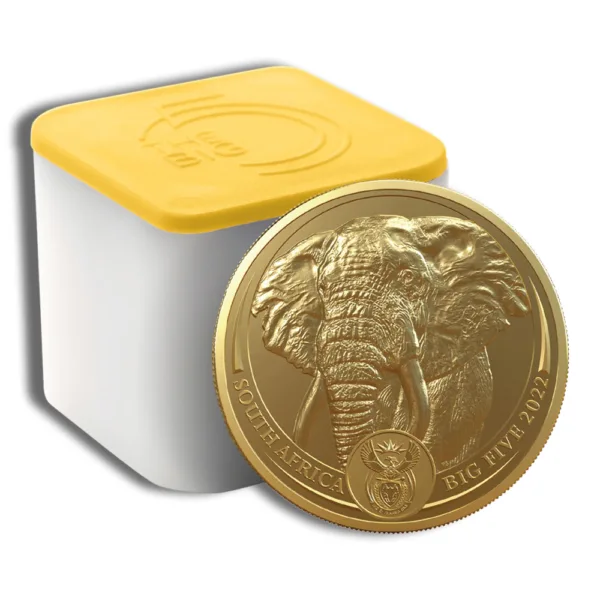 Gold coin featuring an elephant design, representing the South African Big Five series, alongside a protective yellow container for storage.