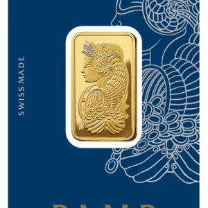 Gold bar from PAMP Suisse featuring intricate design, displayed on a blue background with the label "Swiss Made." Ideal for investment and collection.