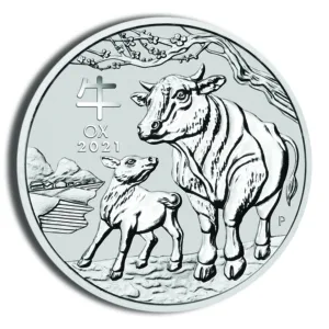 Silver coin featuring a cow and calf design, minted in 2021, showcasing agricultural themes and wildlife conservation.