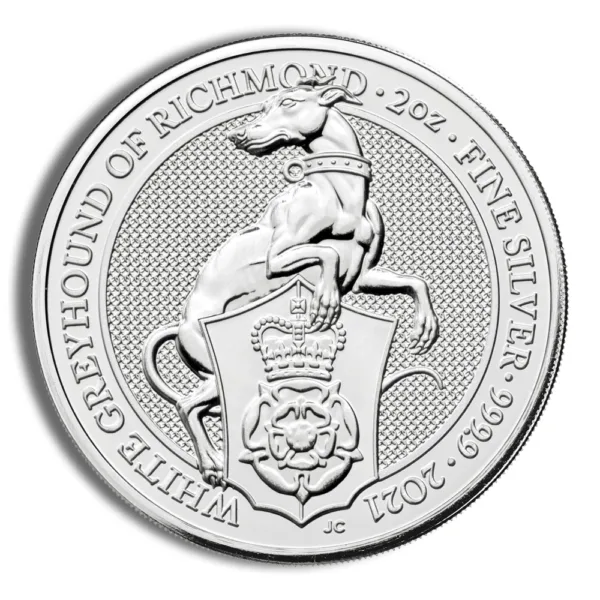 Silver coin featuring the White Greyhound of Richmond design, inscribed with "1 oz Fine Silver 999" and the year "2014." The coin showcases intricate detailing of the greyhound and a heraldic shield, symbolizing British heritage and numismatic artistry.
