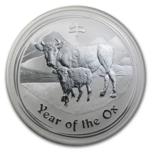 Silver coin depicting an ox and calf with the text "Year of the Ox," symbolizing prosperity and strength in the Chinese zodiac.