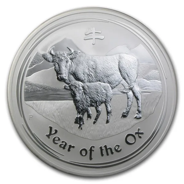 Silver coin depicting an ox and calf with the text "Year of the Ox," symbolizing prosperity and strength in the Chinese zodiac.