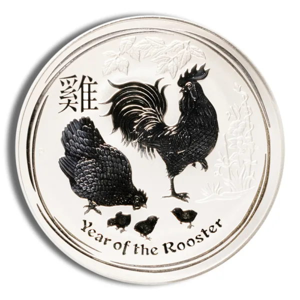 Illustration of a coin featuring a rooster and chicks, symbolizing the Year of the Rooster in the Chinese zodiac, with Chinese characters for "rooster" and the phrase "Year of the Rooster."