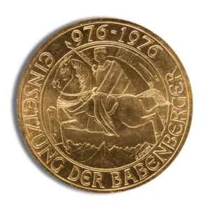 Gold commemorative coin from 1976, featuring a design related to the Babenberger family, with the inscription "Gedenkprägung der Babenberger" and the years 976-1976.