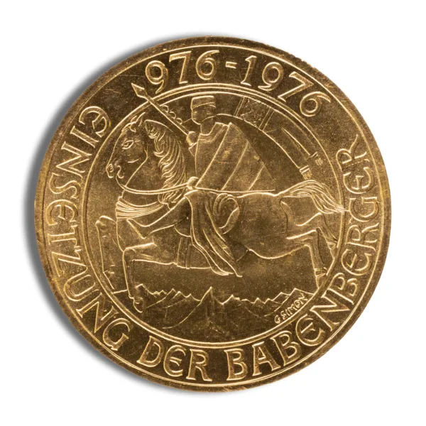 Gold commemorative coin from 1976, featuring a design related to the Babenberger family, with the inscription "Gedenkprägung der Babenberger" and the years 976-1976.