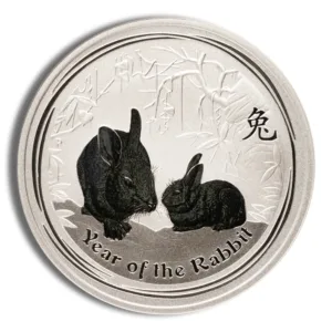 Silver coin featuring the design of two rabbits, symbolizing the Year of the Rabbit, with intricate bamboo background and Chinese characters. Ideal for collectors and those celebrating Lunar New Year.