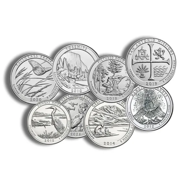 Collection of commemorative silver coins featuring various designs, including landscapes and state seals, arranged in a circular pattern.