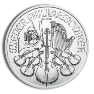 Silver coin featuring the Wiener Philharmoniker design, showcasing musical instruments like violins, a harp, and a French horn, with the inscription "Wiener Philharmoniker" prominently displayed.
