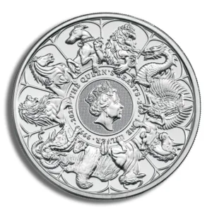 Silver commemorative coin featuring a portrait of a queen surrounded by intricate designs of mythical creatures and heraldic symbols, representing British heritage and craftsmanship.