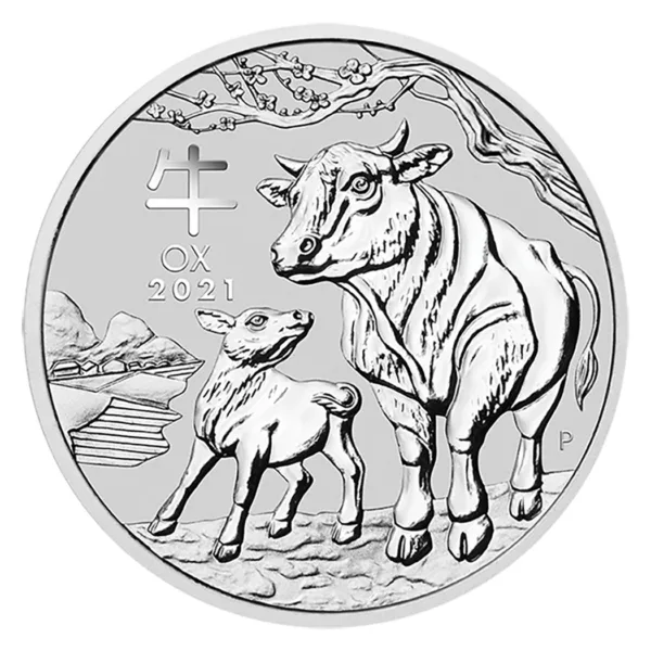 Silver coin featuring a cow and calf design, symbolizing agriculture and livestock, with a landscape background.