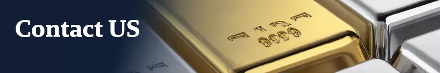 Close-up of gold and silver bullion bars with inscriptions, featuring the text "Contact Us" prominently displayed on a dark background, emphasizing customer outreach for investment inquiries.