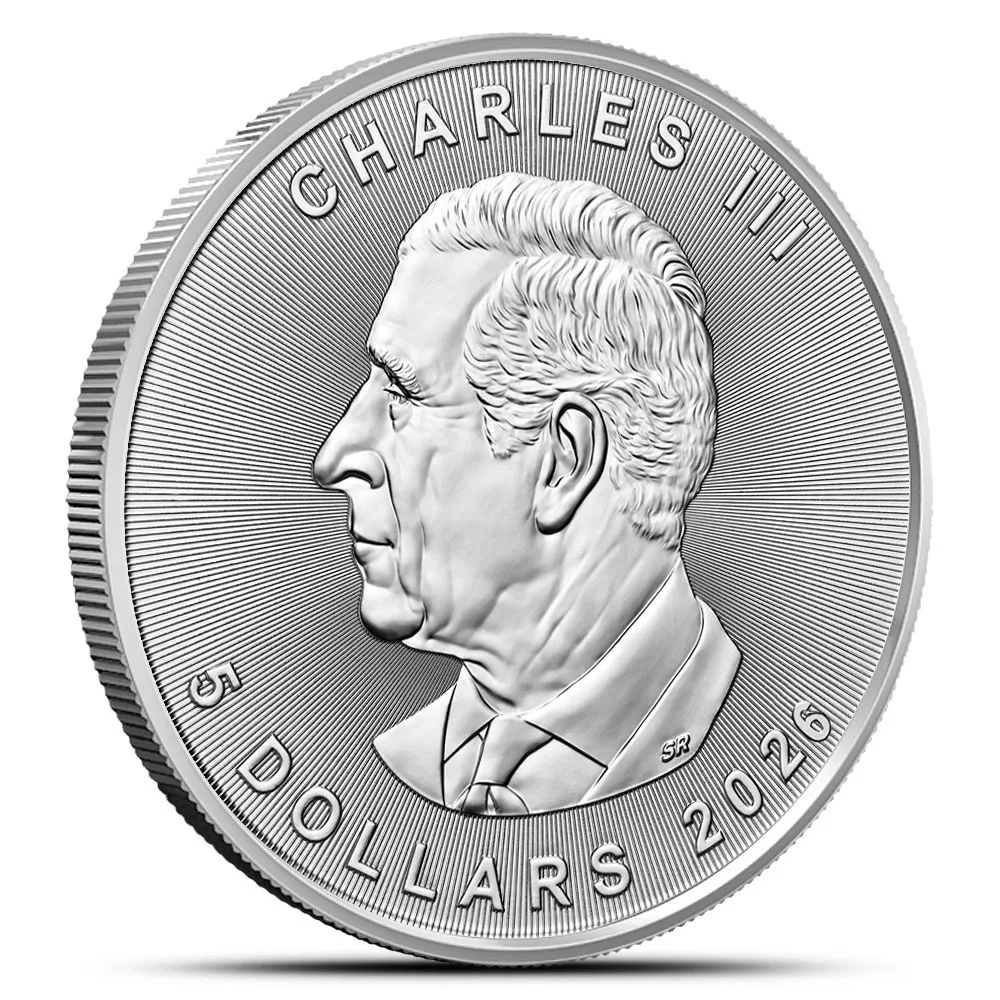 Silver commemorative coin featuring a profile of Charles III, with the inscription "5 DOLLARS 2026" and radiating lines in the background, symbolizing modern currency design.